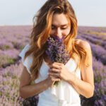 how-smell-impacts-body-woman-smelling-lavender-field.jpg.jpeg